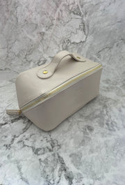 Bolsa para maquillaje cerrada color hueso